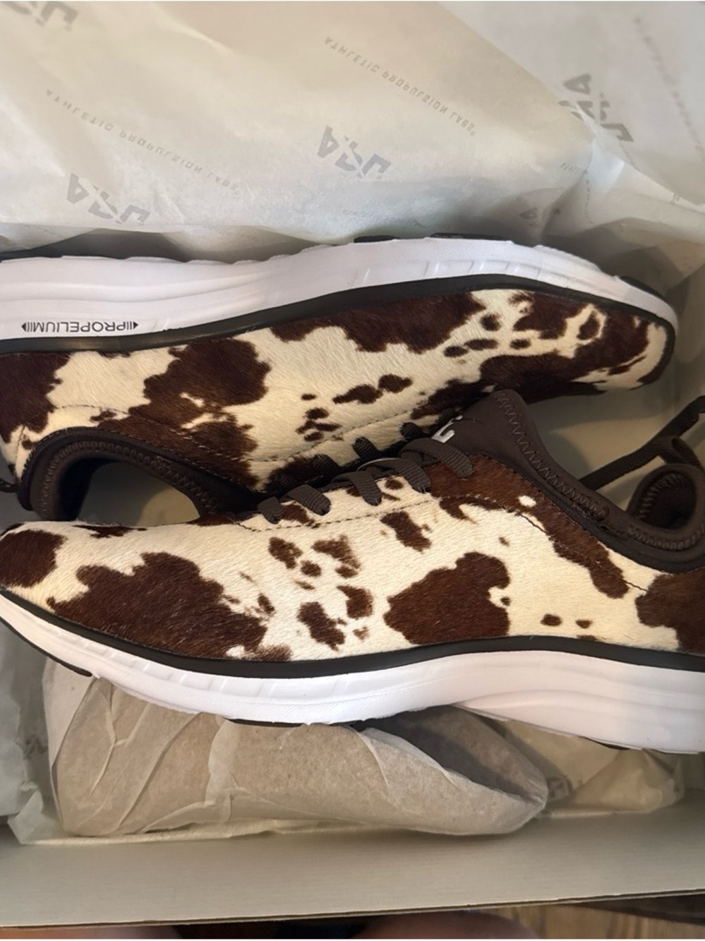 APL Cow Print Athletic Sneakers in Brown and White